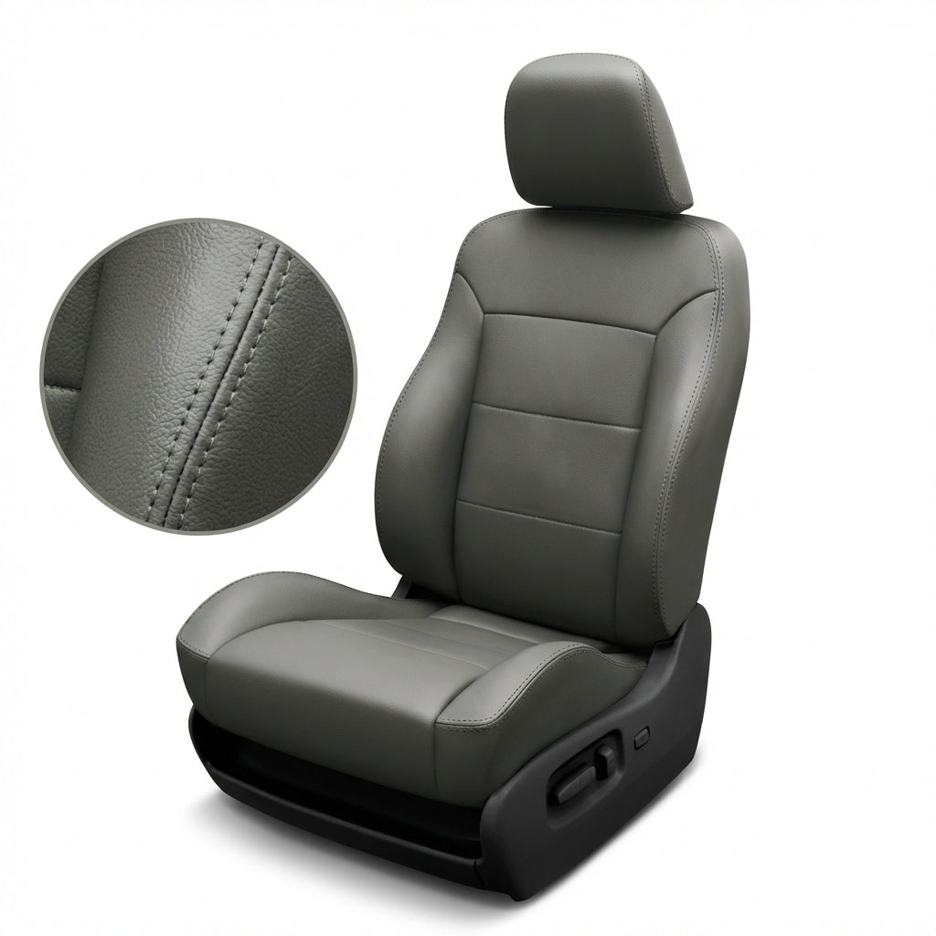Close-up image of a 2007 Chrysler Aspen Katzkin/Leatherteck leather seat cover upholstery kit (F2) in dark gray on a white background, showing a full front seat with matching dark gray panels and an inset highlighting the leather grain and double-row stitching detail.